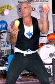 The Amazing Great Scott Is All Concentration As He Entertains The Evening Crowd-gallery